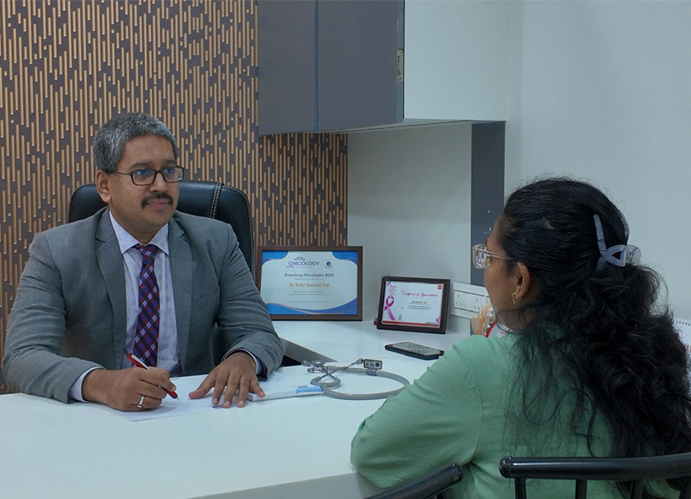 Dr Rohit Pai, Oncologist in Mumbai with Patient